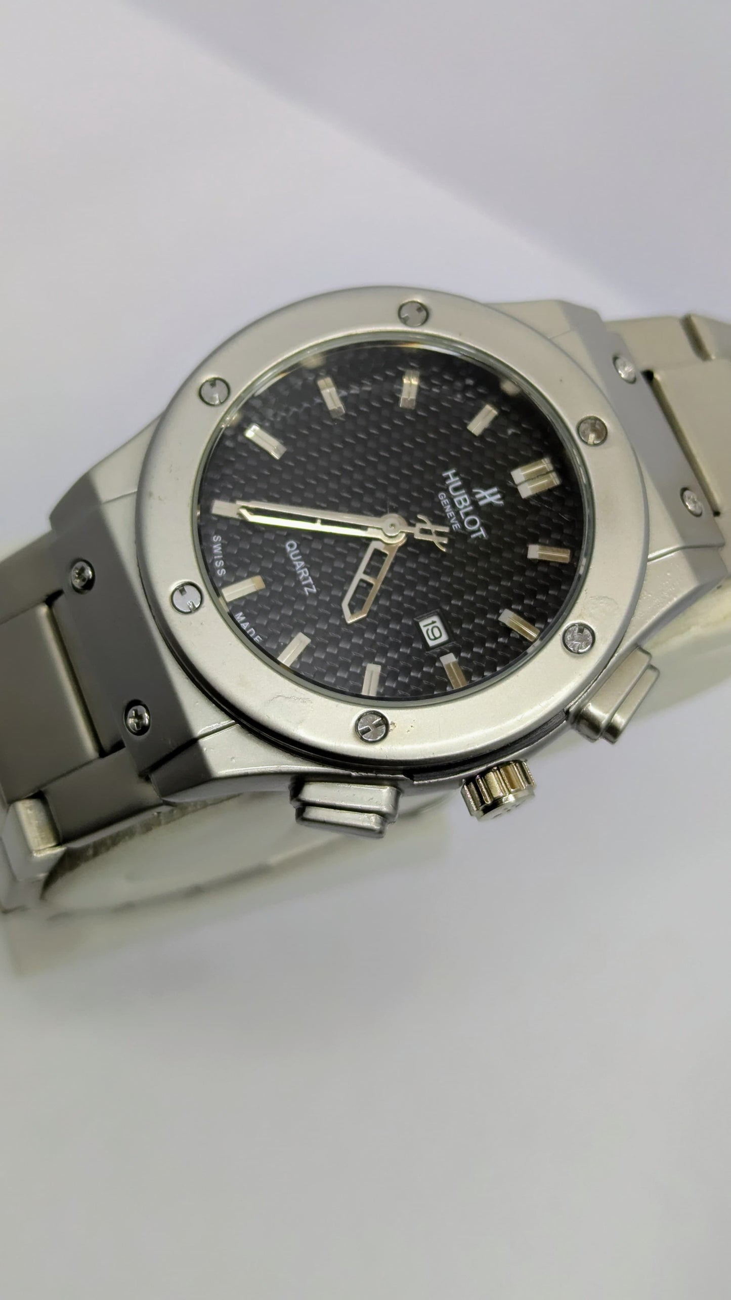 Hublot Genève – Silver with Black Dial.