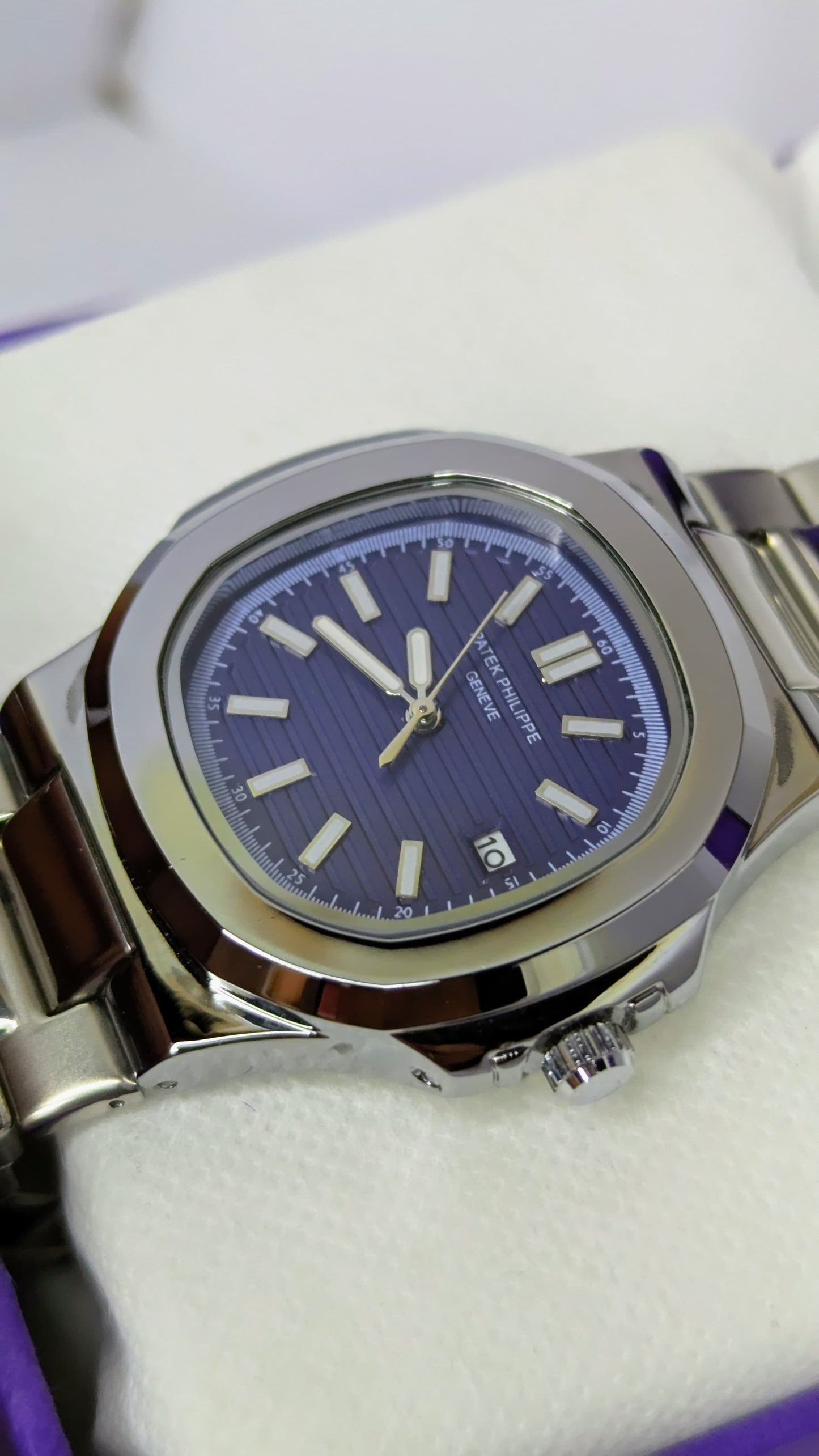 PP Silver with Navy Blue Dial.