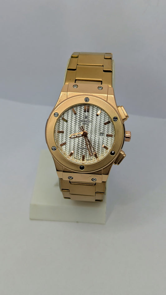 Hublot Genève – Gold with White Dial.