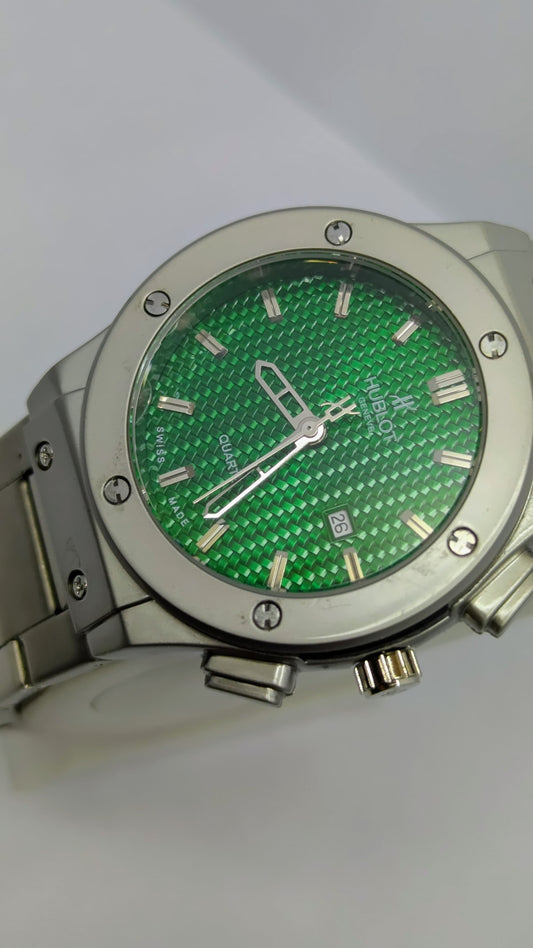 Hublot Genève – Silver with Green Dial.
